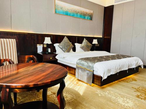 Postel nebo postele na pokoji v ubytování Sunbelt Hotels and Suites International