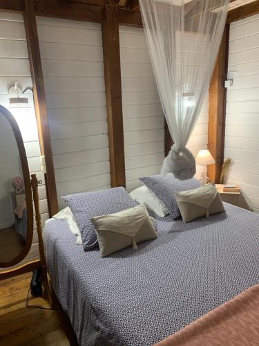 Giường trong phòng chung tại Chalet Kreol