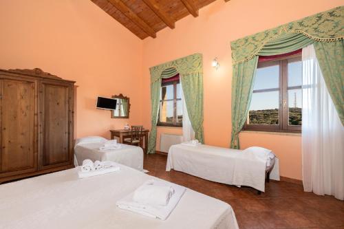 Postel nebo postele na pokoji v ubytování Hotel Funtana Noa
