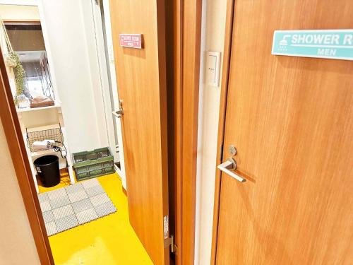 a door with a sign for a shower room at kupono - Vacation STAY 00621v in Minamiboso
