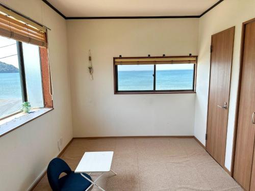 a room with a table and a window at kupono - Vacation STAY 00637v in Minamiboso