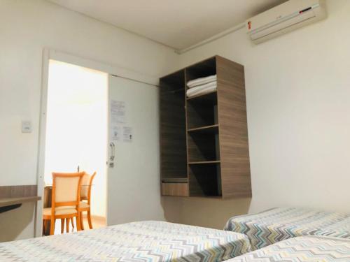 Ένα ή περισσότερα κρεβάτια σε δωμάτιο στο Casa no térreo - 3 quartos - Caçari