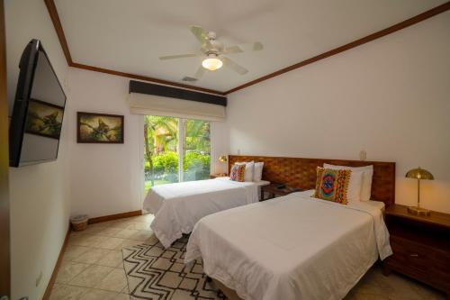 Postel nebo postele na pokoji v ubytování Veranda 6F 2 bdr Garden View in Los Suenos