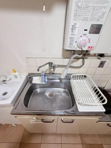 Large two separated rooms with 5 beds in the Osaka