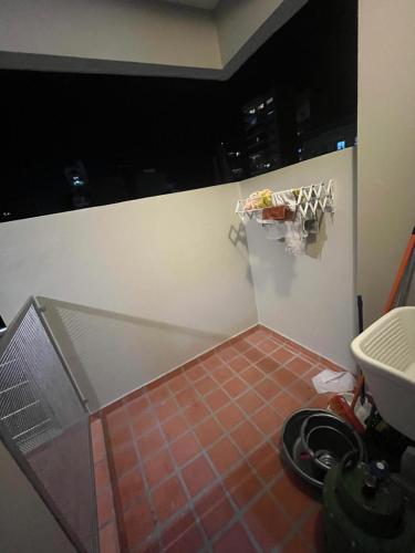 a bathroom with a shower with a tiled floor at cerca de costa y centro con cochera in Corrientes