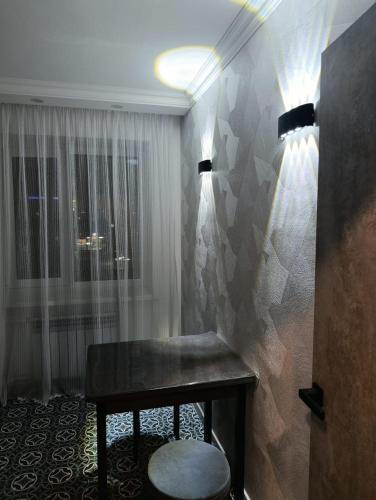 Et badeværelse på Уютная квартира в центре!