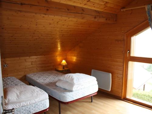 Chalet spacieux à Gérardmer avec terrasse et équipements familiaux
