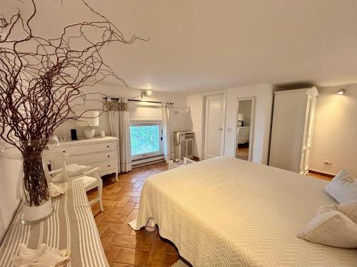 Postel nebo postele na pokoji v ubytování La casa del Capitano B&b