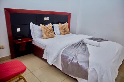 Postel nebo postele na pokoji v ubytování hotel samba