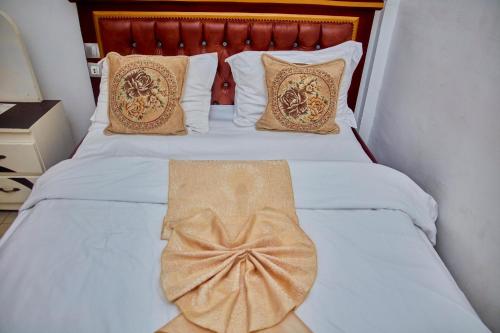 Postel nebo postele na pokoji v ubytování hotel samba
