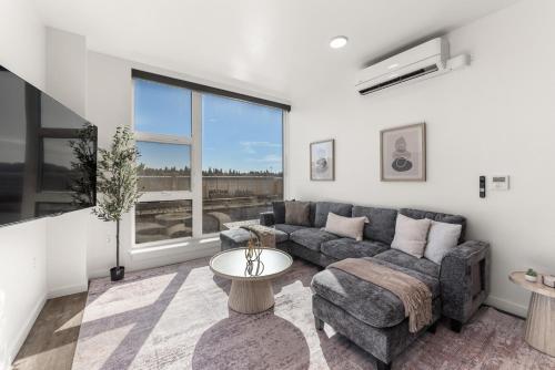 Posezení v ubytování 2BR Cozy Apartment in DT