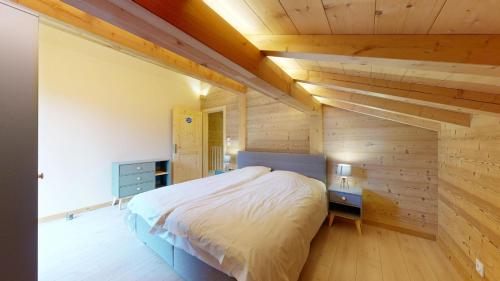 Ένα ή περισσότερα κρεβάτια σε δωμάτιο στο Chalet La Frenaie FRN NATURE & MODERN 10 Pers