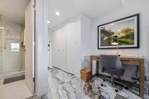 a home office with a desk and a chair at Copperheads 14th Hole Tee Box View in Lake Shore Estates