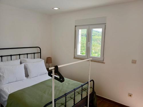 Postel nebo postele na pokoji v ubytování Quinta Da Batoca