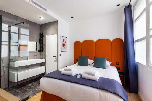 Katil atau katil-katil dalam bilik di Wonderful apartment in Paris, near Notre Dame Cathedral