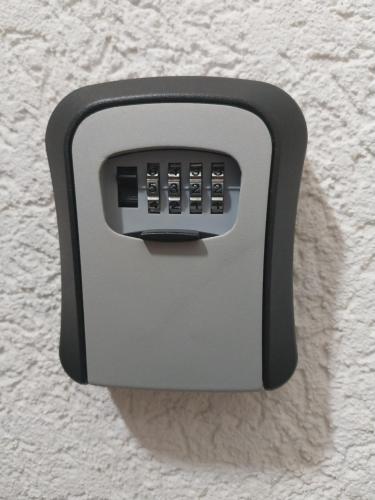 a lightswitch on a wall with at Park Apartment in Kochani
