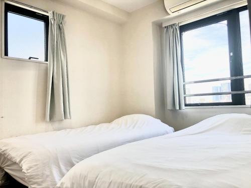 Postel nebo postele na pokoji v ubytování Green House Nakano Fujimicho - Vacation STAY 65278v