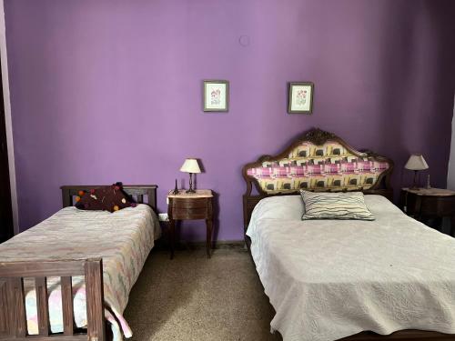 Ένα ή περισσότερα κρεβάτια σε δωμάτιο στο Dormitorio en casa de familia