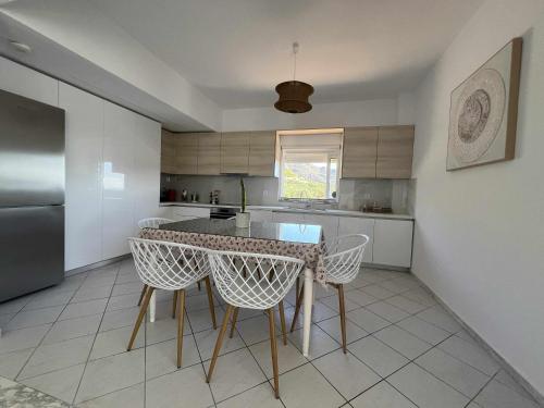 Kuchyň nebo kuchyňský kout v ubytování Villa Rania