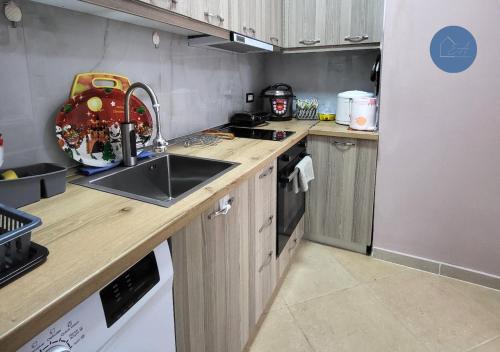 Kuhinja ili čajna kuhinja u objektu Flor Apartment