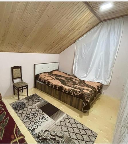 Llit o llits en una habitació de Bağ evi