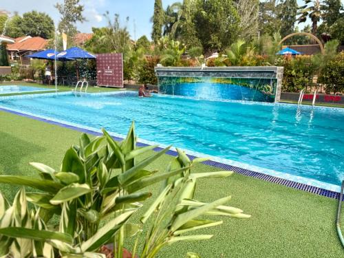 Bazén v ubytování Signature Resort Hotel Jinja nebo v jeho okolí
