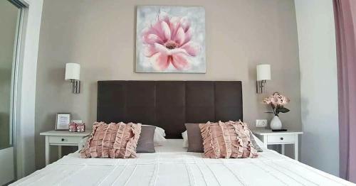 Postel nebo postele na pokoji v ubytování Villa Ana Seafront Apartments