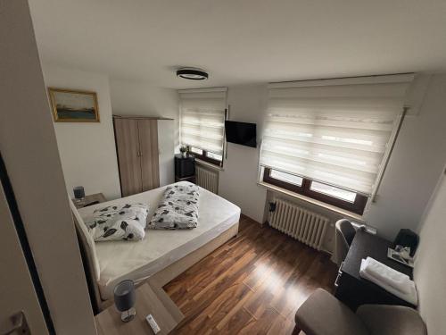 Postel nebo postele na pokoji v ubytování Restaurant Motel Friesdorfer Hof
