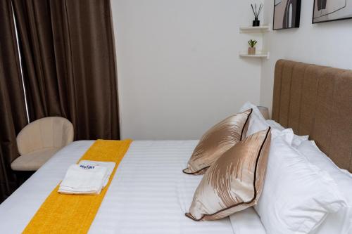 Postel nebo postele na pokoji v ubytování Destiny Apartments