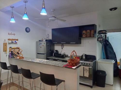 Η κουζίνα ή μικρή κουζίνα στο Beach House - Ibiza Beach