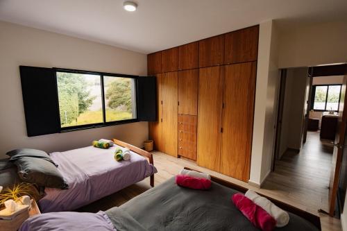 Ένα ή περισσότερα κρεβάτια σε δωμάτιο στο Casa Luan, Pool & Amenities in Sumiya, Morelos