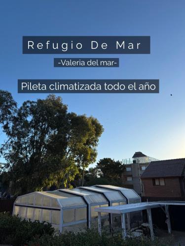 a row of domes on top of a building at Refugio De Mar in Valeria del Mar