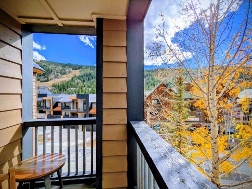 a balcony with a table and a view at Dakota Lodge 8503 by SummitCove Lodging in Colorado in Keystone