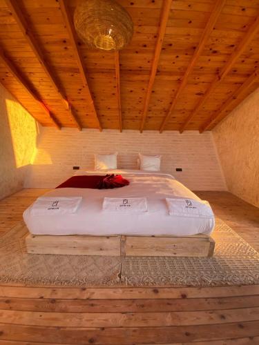 Postel nebo postele na pokoji v ubytování La Pointe d'Or Dakhla