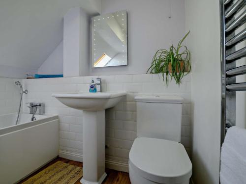 Et badeværelse på 3 Bed in West Bay DC024