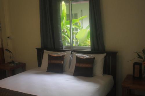 เตียงในห้องที่ Privacy Resort - Koh Chang