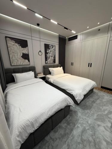 Postel nebo postele na pokoji v ubytování Luxury 2 bedrooms holiday homes only families