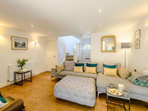 a living room with a couch and a table at 3 Bed in Thornham KT104 in Thornham