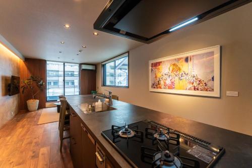 Kuchyň nebo kuchyňský kout v ubytování Flower Base TSUBAKI - Vacation STAY 59155v