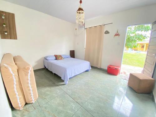 En eller flere senge i et værelse på Casa de praia em Mosqueiro 60km de Belém para COP30