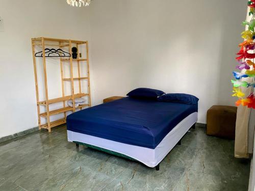 En eller flere senge i et værelse på Casa de praia em Mosqueiro 60km de Belém para COP30