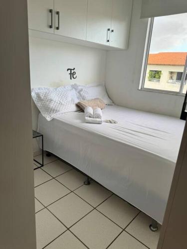 Una cama o camas en una habitación de Apartamento Completo