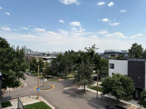 an aerial view of a parking lot in a city at Cozy 3 Bedroom Denver Home by Mile High Stadium and Downtown! in Denver
