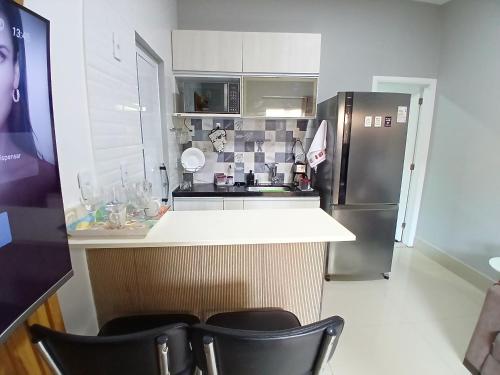 Kuchyň nebo kuchyňský kout v ubytování Casa c AR - condominio prox Parkshopping Campo Grande