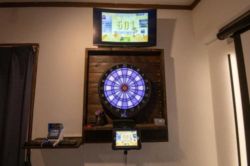 a video game machine with a tv on top of it at Cinema Resorts 1 in Motobu