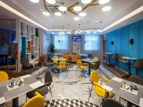 Posezení v ubytování Magnotel Hotel Shiyan Wuyan Pedestrian Street