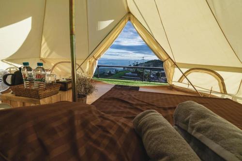 Un pat sau paturi într-o cameră la The Doi Moncham