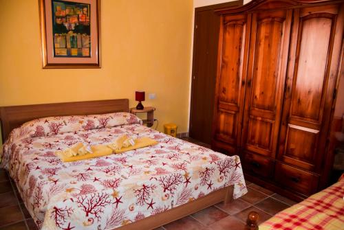 Cama o camas de una habitación en B&B Nonna Sini
