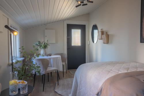 Ένα ή περισσότερα κρεβάτια σε δωμάτιο στο Sentrum Studio Haugesund