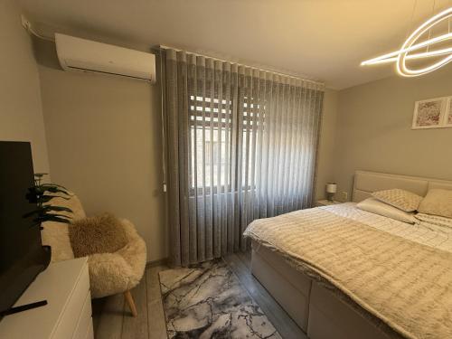 Postel nebo postele na pokoji v ubytování Мия 6 Deluxe